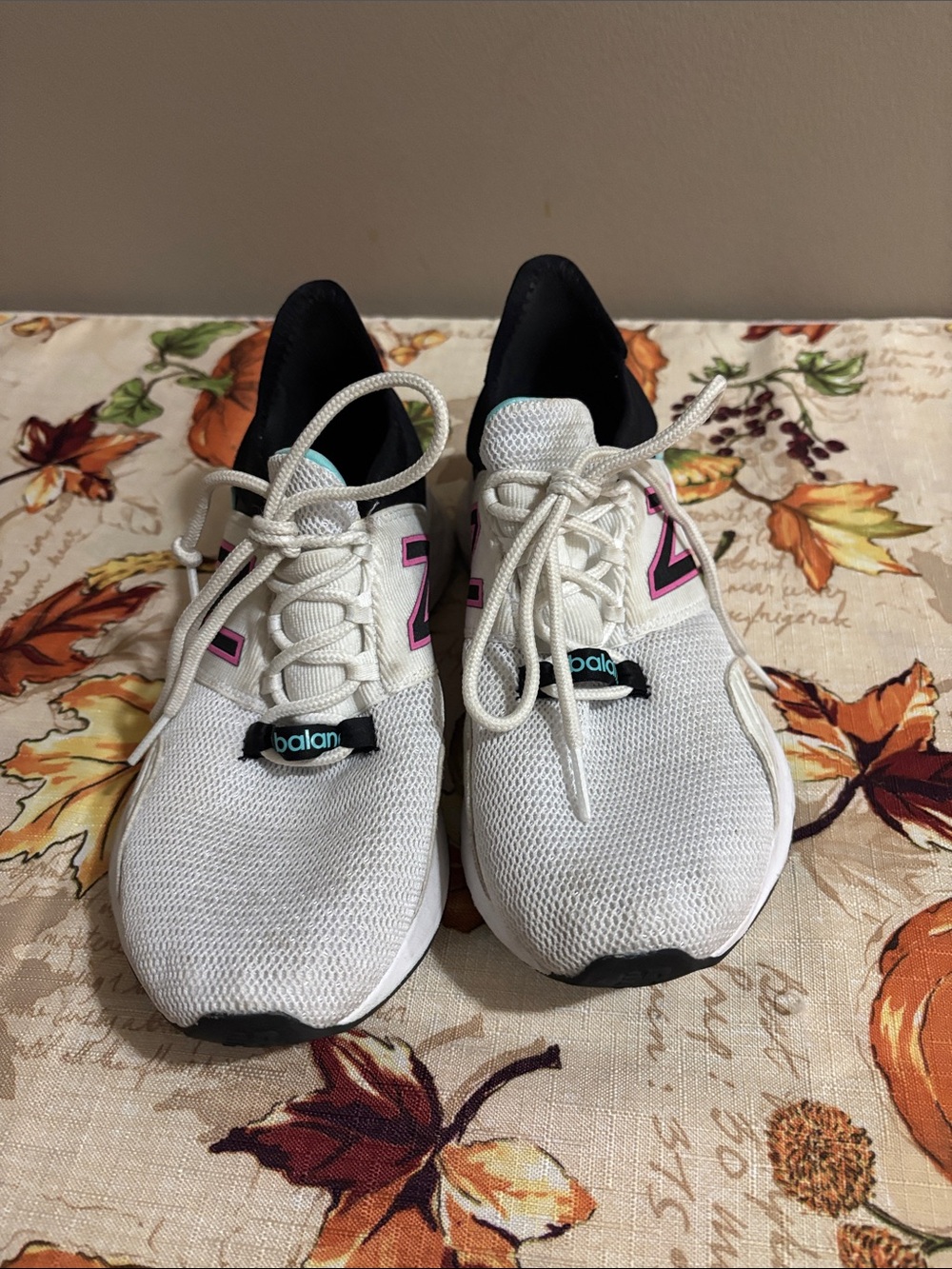 New Balance White Sneakers with Aqua Tongue and Pink Insole Logo